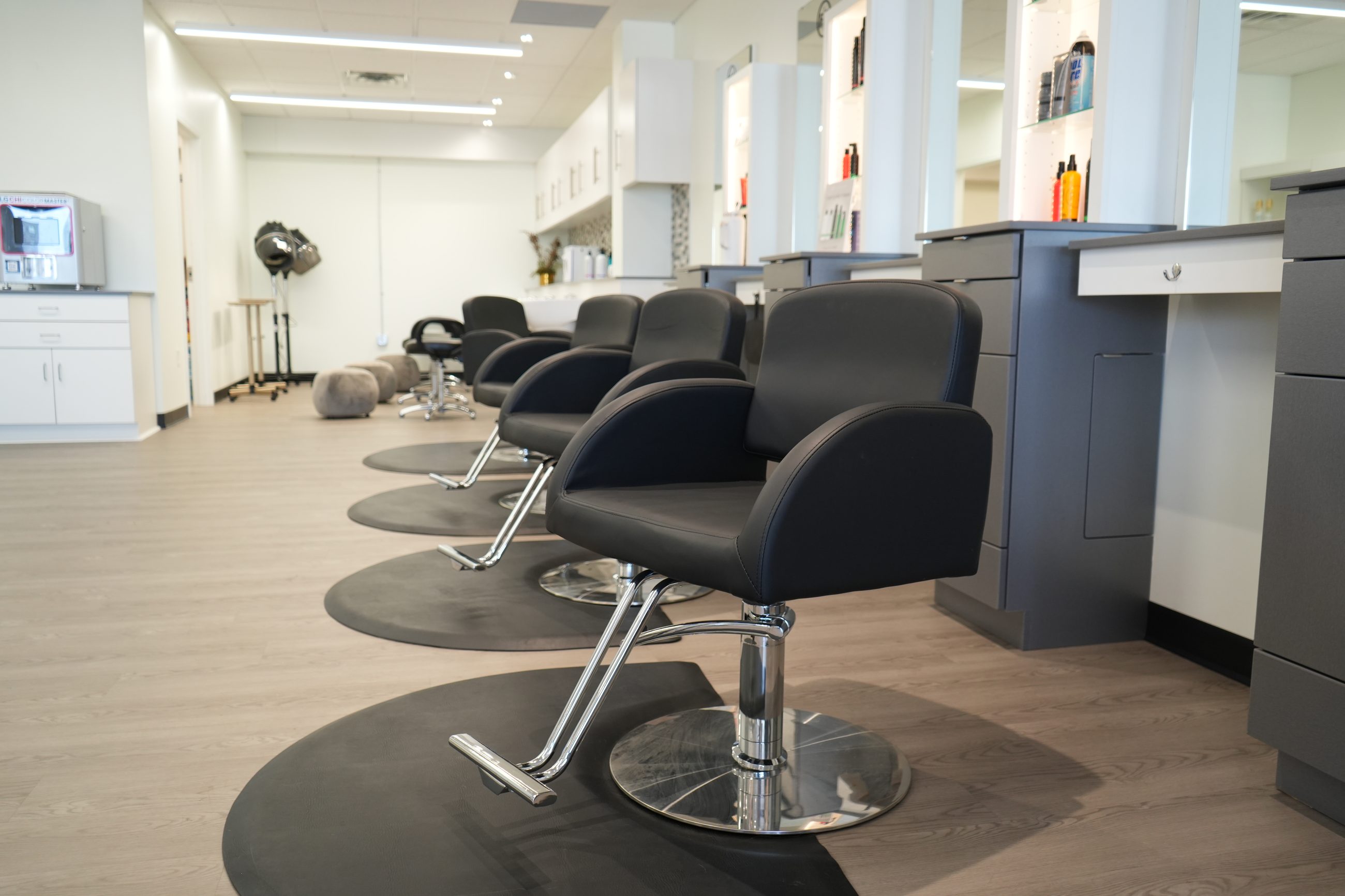 Styling stations inside an FS Cut & Colour salon